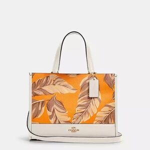 Coach Dempsey Caryall with Banana Leaf Print